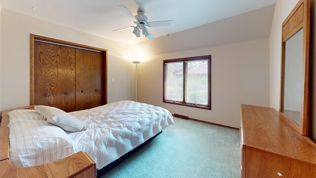 209 Viola Ln, Prospect Heights, IL 60070 - bedroom with light colored carpet, a closet, ceiling fan, and baseboards