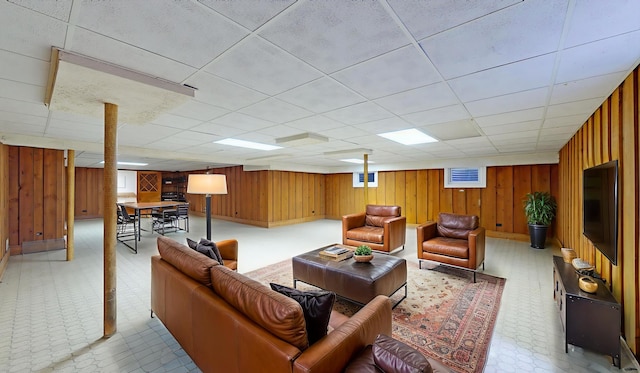 209 Viola Ln, Prospect Heights, IL 60070 - living room featuring wooden walls, a paneled ceiling, and baseboards