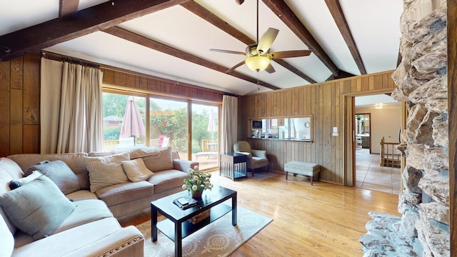 209 Viola Ln, Prospect Heights, IL 60070 - living area featuring a ceiling fan, wooden walls, and light wood-type flooring