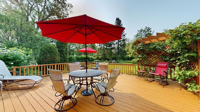 209 Viola Ln, Prospect Heights, IL 60070 - deck with outdoor dining space and view of wooded area