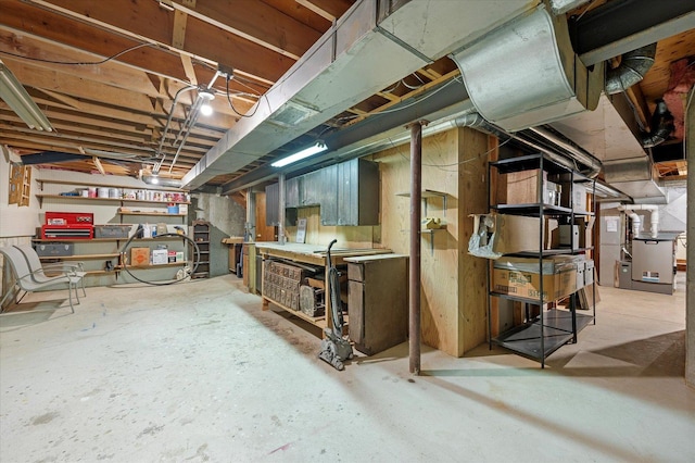 1144 W Trinity Dr, Addison, IL 60101 - unfinished basement featuring a workshop area and heating unit