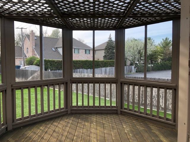 1144 W Trinity Dr, Addison, IL 60101 - unfurnished sunroom with a water view