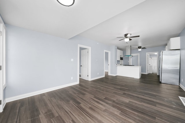 306 Barry Ave, Lockport, IL 60441 - unfurnished living room with ceiling fan, dark wood-type flooring, and baseboards