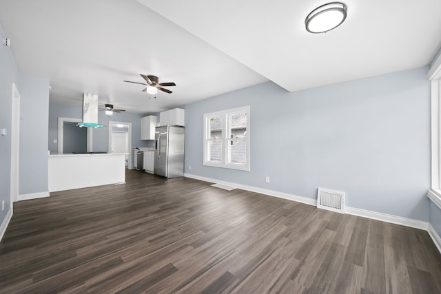 306 Barry Ave, Lockport, IL 60441 - unfurnished living room with ceiling fan, dark wood finished floors, and baseboards