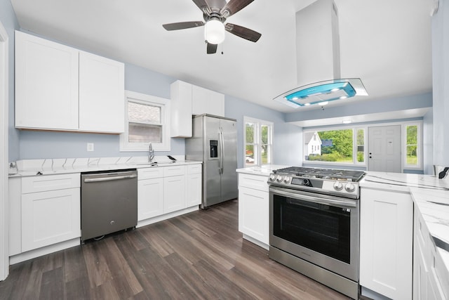 306 Barry Ave, Lockport, IL 60441 - kitchen with appliances with stainless steel finishes, island exhaust hood, dark wood-style floors, white cabinetry, and a sink