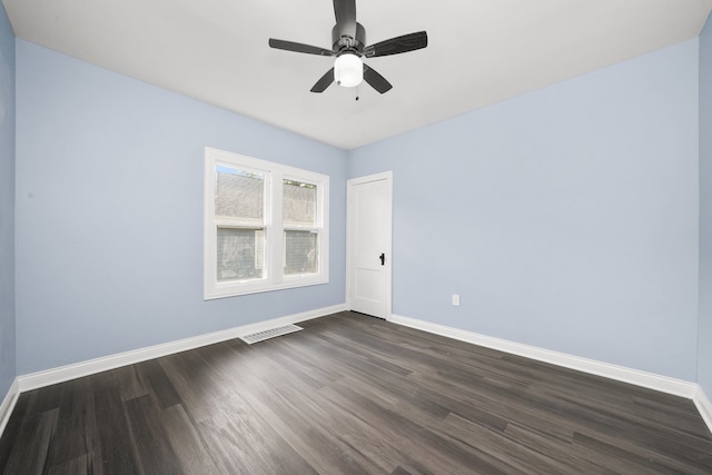 306 Barry Ave, Lockport, IL 60441 - empty room with dark wood-style flooring, baseboards, and a ceiling fan