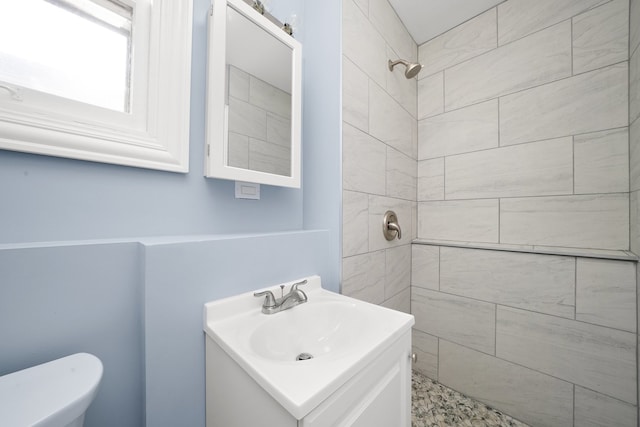 306 Barry Ave, Lockport, IL 60441 - bathroom featuring vanity, a tile shower, and toilet
