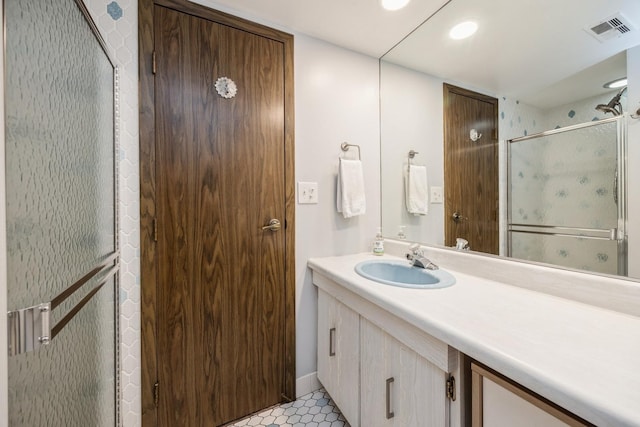 1419 Bonnie Brae Pl Unit 3B, River Forest, IL 60305 - full bathroom featuring a stall shower, vanity, and tile patterned flooring