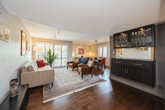 1419 Bonnie Brae Pl Unit 3B, River Forest, IL 60305 - living area with rail lighting, dark wood finished floors, plenty of natural light, and a bar