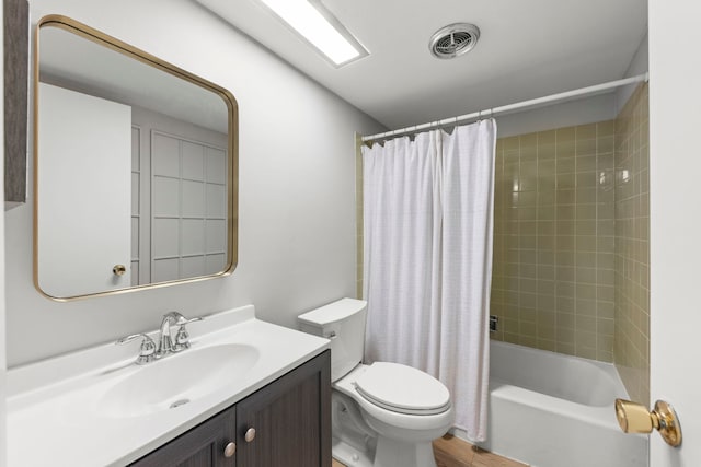 2051 Creekside Dr Unit 2-2, Wheaton, IL 60189 - full bathroom with vanity, toilet, shower / bath combo with shower curtain, and wood finished floors