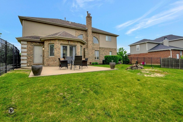 1205 Jennie Dr, New Lenox, IL 60451 - back of property featuring a patio, a chimney, and brick siding