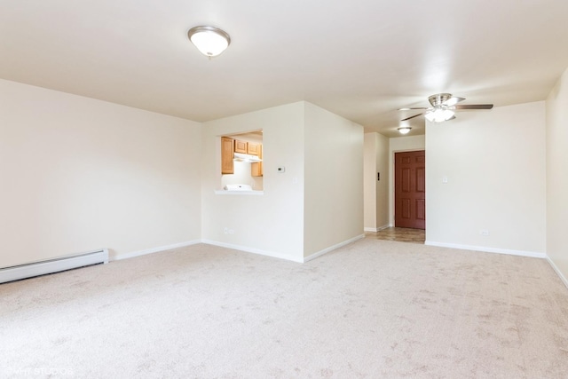 516 N Wilke Rd Unit 105, Palatine, IL 60074 - unfurnished room featuring light colored carpet, ceiling fan, baseboards, and baseboard heating