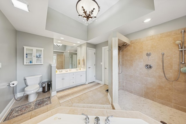 131 N Wilmette Ave, Westmont, IL 60559 - full bath with vanity, toilet, tiled shower, tile patterned flooring, and a garden tub