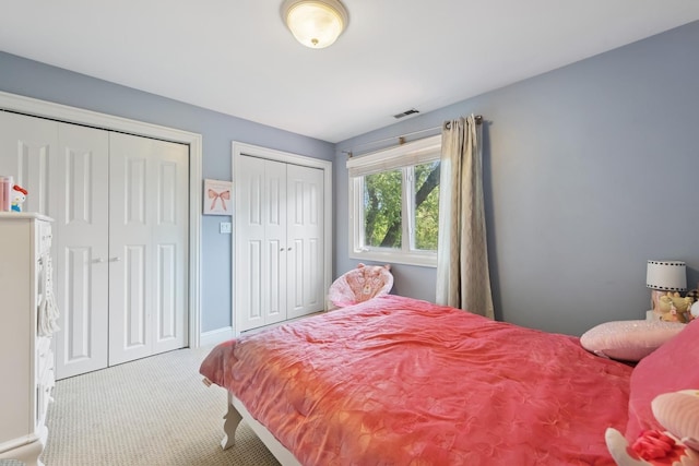 131 N Wilmette Ave, Westmont, IL 60559 - carpeted bedroom featuring multiple closets and baseboards