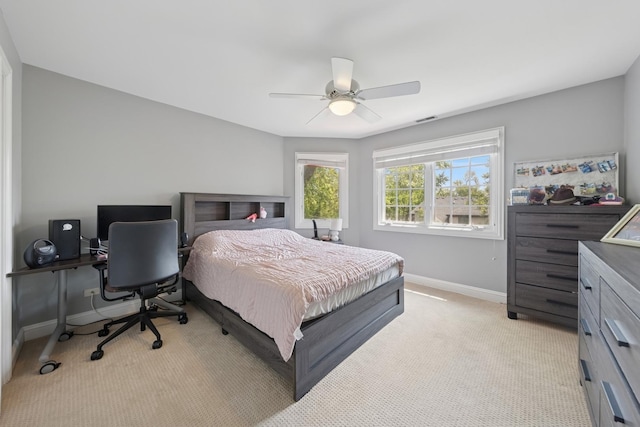 131 N Wilmette Ave, Westmont, IL 60559 - bedroom with baseboards, light colored carpet, an office area, and a ceiling fan