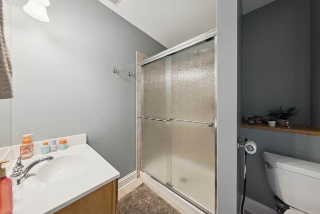 131 N Wilmette Ave, Westmont, IL 60559 - full bath featuring vanity, a stall shower, toilet, and baseboards