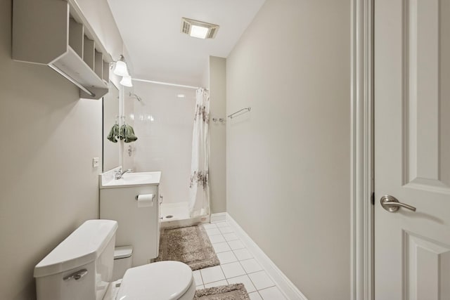 131 N Wilmette Ave, Westmont, IL 60559 - full bathroom featuring toilet, a stall shower, tile patterned floors, and vanity