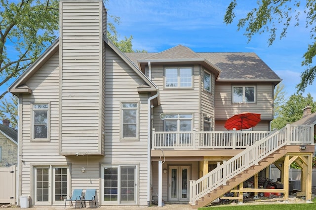 131 N Wilmette Ave, Westmont, IL 60559 - back of house with stairway, a wooden deck, a chimney, and a shingled roof