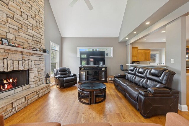 131 N Wilmette Ave, Westmont, IL 60559 - living room with a fireplace, healthy amount of natural light, high vaulted ceiling, light wood-style floors, and recessed lighting