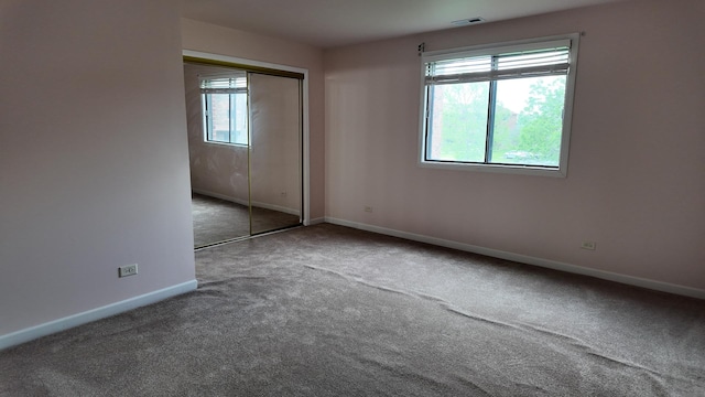 15711 Peggy Ln Unit 7, Oak Forest, IL 60452 - unfurnished bedroom featuring carpet flooring, baseboards, and a closet