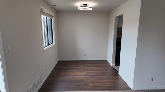 15711 Peggy Ln Unit 7, Oak Forest, IL 60452 - unfurnished room with dark wood-style flooring and baseboards