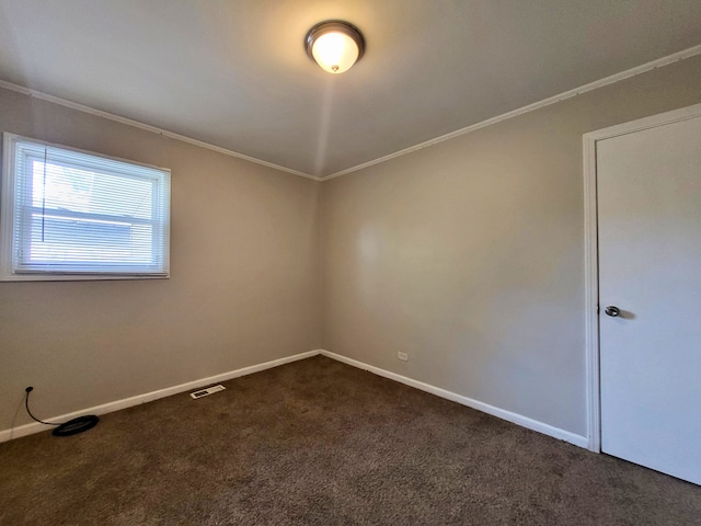 304 Shawnee St, Park Forest, IL 60466 - unfurnished room with dark colored carpet and crown molding