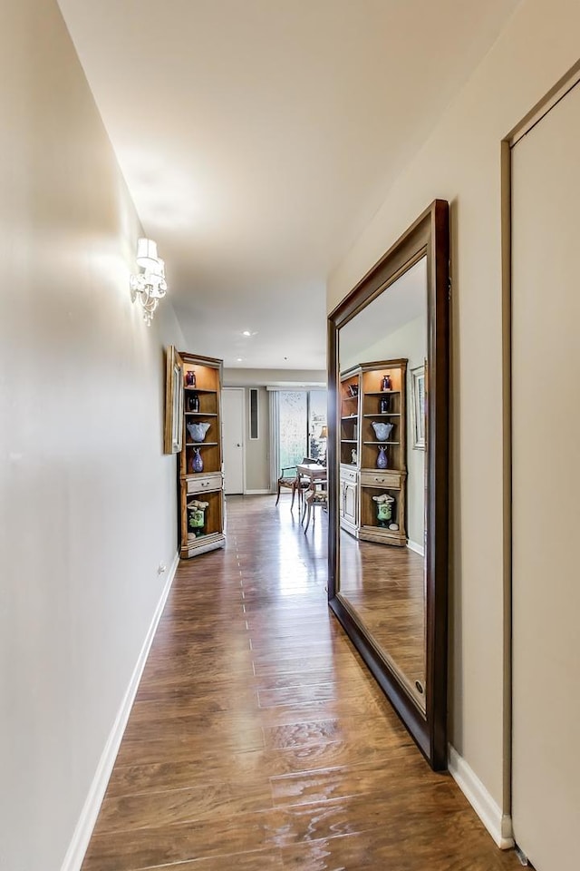 2050 Arbor Ln Unit 301, Northfield, IL 60093 - hall with baseboards and wood finished floors