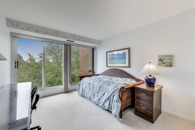 2050 Arbor Ln Unit 301, Northfield, IL 60093 - carpeted bedroom with baseboards