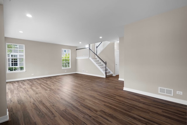 1944 Sundrop Ct Unit 0, Bartlett, IL 60103 - unfurnished living room with dark wood-style flooring, plenty of natural light, baseboards, and recessed lighting