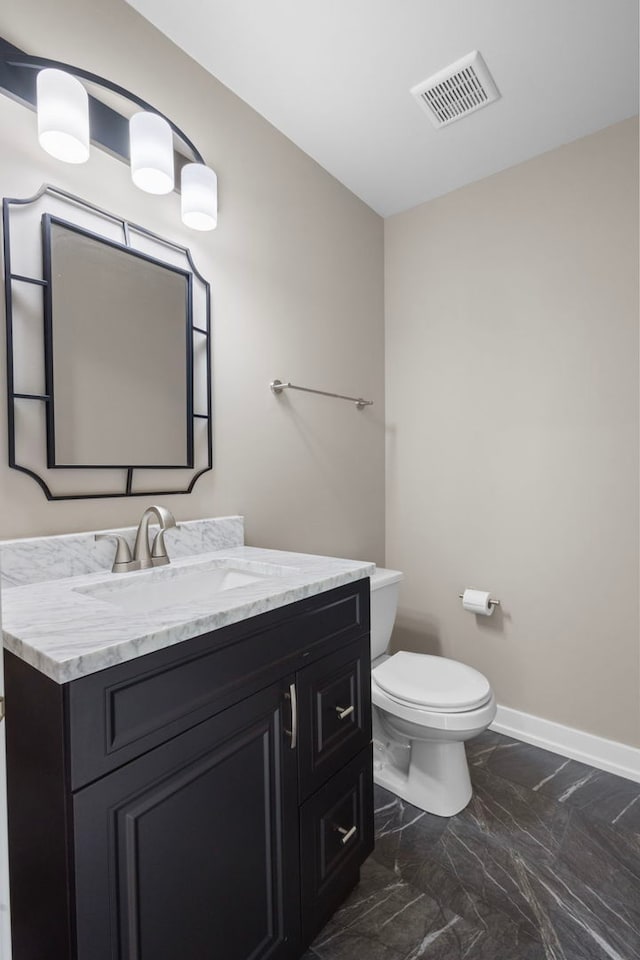 1944 Sundrop Ct Unit 0, Bartlett, IL 60103 - bathroom with marble look tile flooring, vanity, toilet, and baseboards