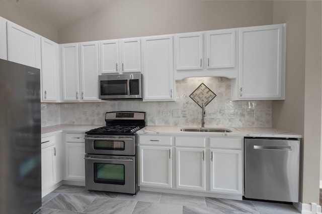 1944 Sundrop Ct Unit 0, Bartlett, IL 60103 - kitchen with appliances with stainless steel finishes, a sink, light stone counters, white cabinets, and lofted ceiling