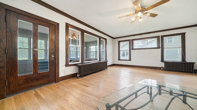 110 E Center St, Mount Morris, IL 61054 - unfurnished sunroom featuring radiator