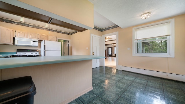 110 E Center St, Mount Morris, IL 61054 - kitchen featuring white appliances, baseboard heating, dark floors, a kitchen bar, and light countertops