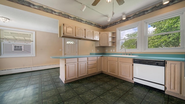 110 E Center St, Mount Morris, IL 61054 - kitchen featuring white dishwasher, a sink, light brown cabinetry, rail lighting, and a peninsula