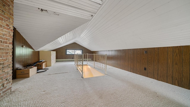 110 E Center St, Mount Morris, IL 61054 - additional living space featuring carpet flooring, wooden walls, and lofted ceiling