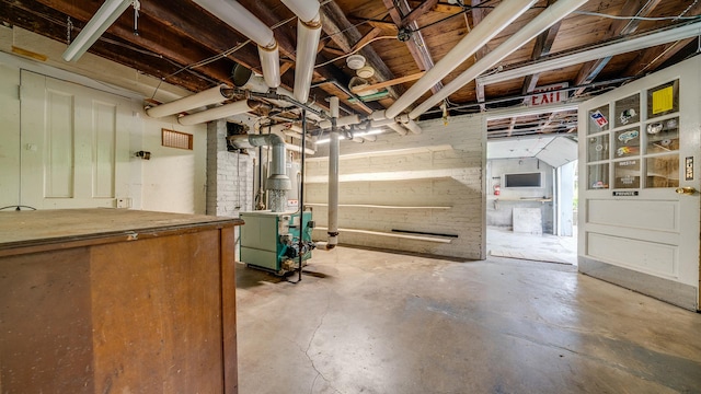 110 E Center St, Mount Morris, IL 61054 - unfinished basement with heating unit
