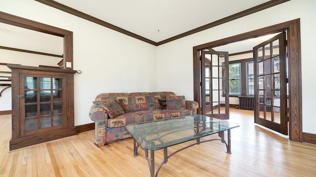 110 E Center St, Mount Morris, IL 61054 - living room featuring french doors, ornamental molding, wood finished floors, and baseboards