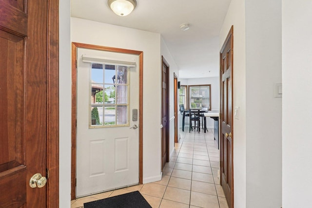 35 Terrace Ln Unit C, Lake Zurich, IL 60047 - hallway featuring light tile patterned floors and baseboards