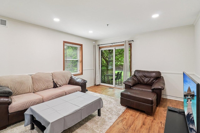 35 Terrace Ln Unit C, Lake Zurich, IL 60047 - living room featuring crown molding, light wood-type flooring, recessed lighting, and baseboards