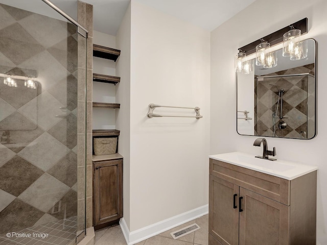 9 Charleston Rd, Hinsdale, IL 60521 - bathroom with a stall shower, vanity, tile patterned floors, baseboards, and a chandelier