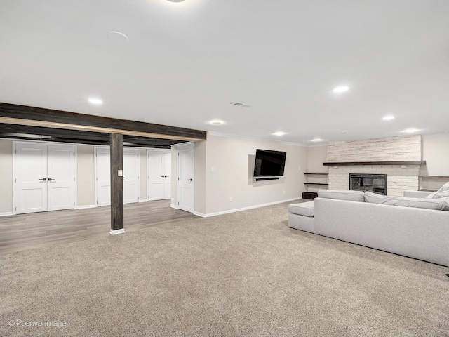 9 Charleston Rd, Hinsdale, IL 60521 - carpeted living area with baseboards, a fireplace, recessed lighting, and crown molding