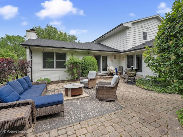 9 Charleston Rd, Hinsdale, IL 60521 - view of patio with an outdoor living space with a fire pit
