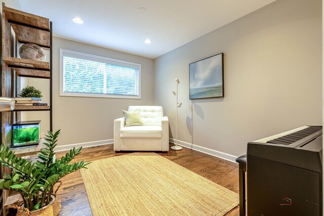 826 Midway Rd, Northbrook, IL 60062 - sitting room featuring baseboards, wood finished floors, and recessed lighting