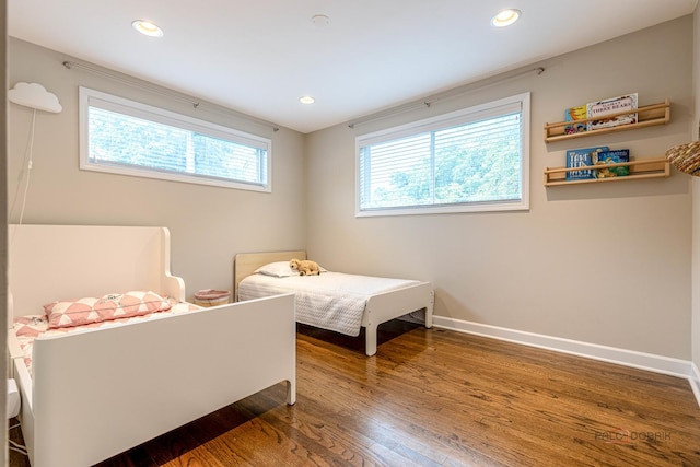 826 Midway Rd, Northbrook, IL 60062 - bedroom with baseboards, wood finished floors, and recessed lighting