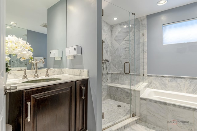 826 Midway Rd, Northbrook, IL 60062 - bathroom with a bath, vanity, a marble finish shower, and recessed lighting
