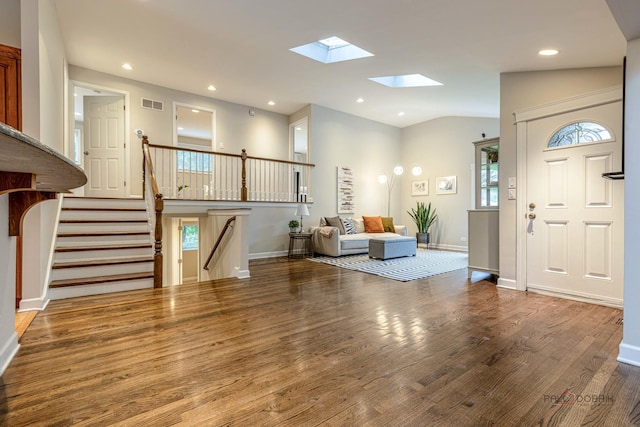 826 Midway Rd, Northbrook, IL 60062 - entryway featuring wood finished floors, a skylight, stairway, baseboards, and recessed lighting