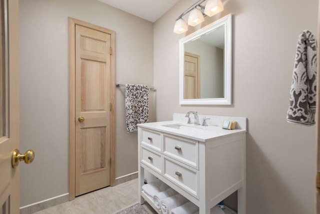 1580 Aberdeen Ct Unit 1580, Naperville, IL 60564 - bathroom featuring vanity and baseboards