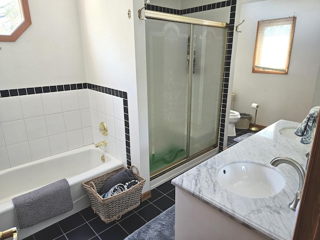 928 S Hillcrest Ave, Elmhurst, IL 60126 - full bathroom with a stall shower, double vanity, toilet, and tile patterned flooring