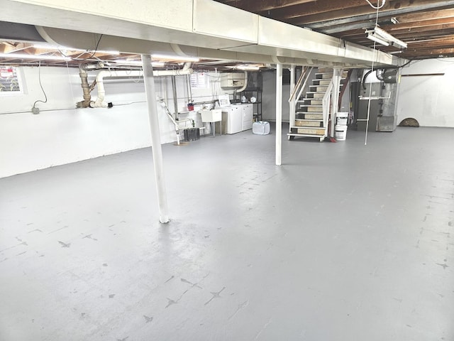 928 S Hillcrest Ave, Elmhurst, IL 60126 - basement featuring heating unit, a sink, washer and dryer, and stairway