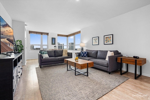 345 N La Salle Dr Unit 3507, Chicago, IL 60654 - living room with light wood-type flooring and baseboards